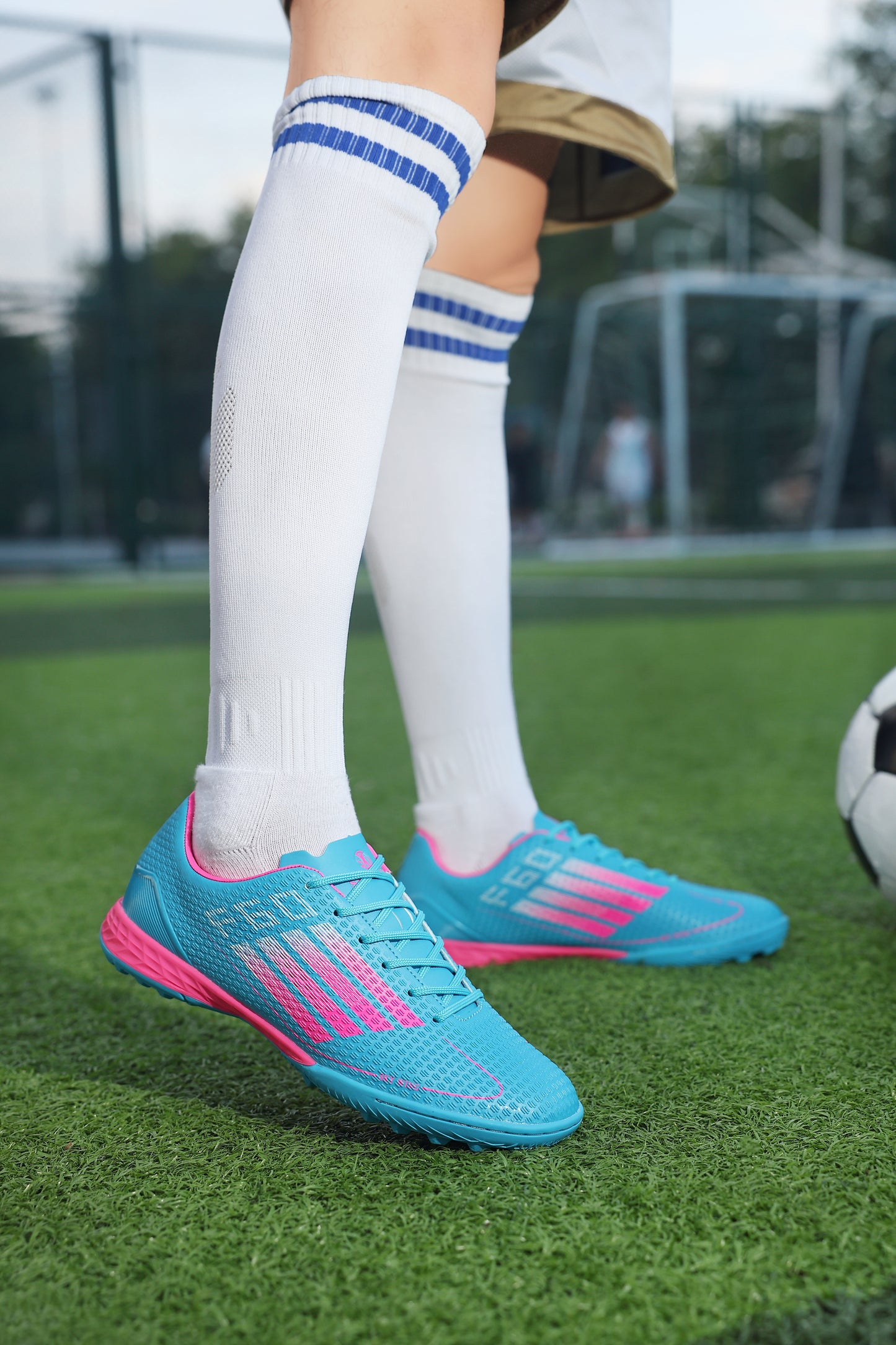 Juniors' SwiftWing Football Shoes